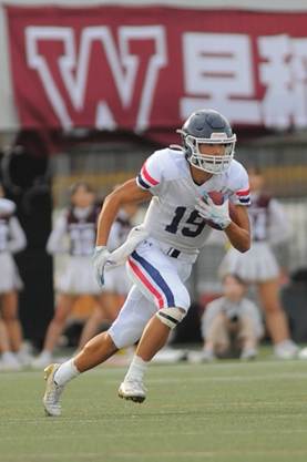 フットボールの選手
自動的に生成された説明